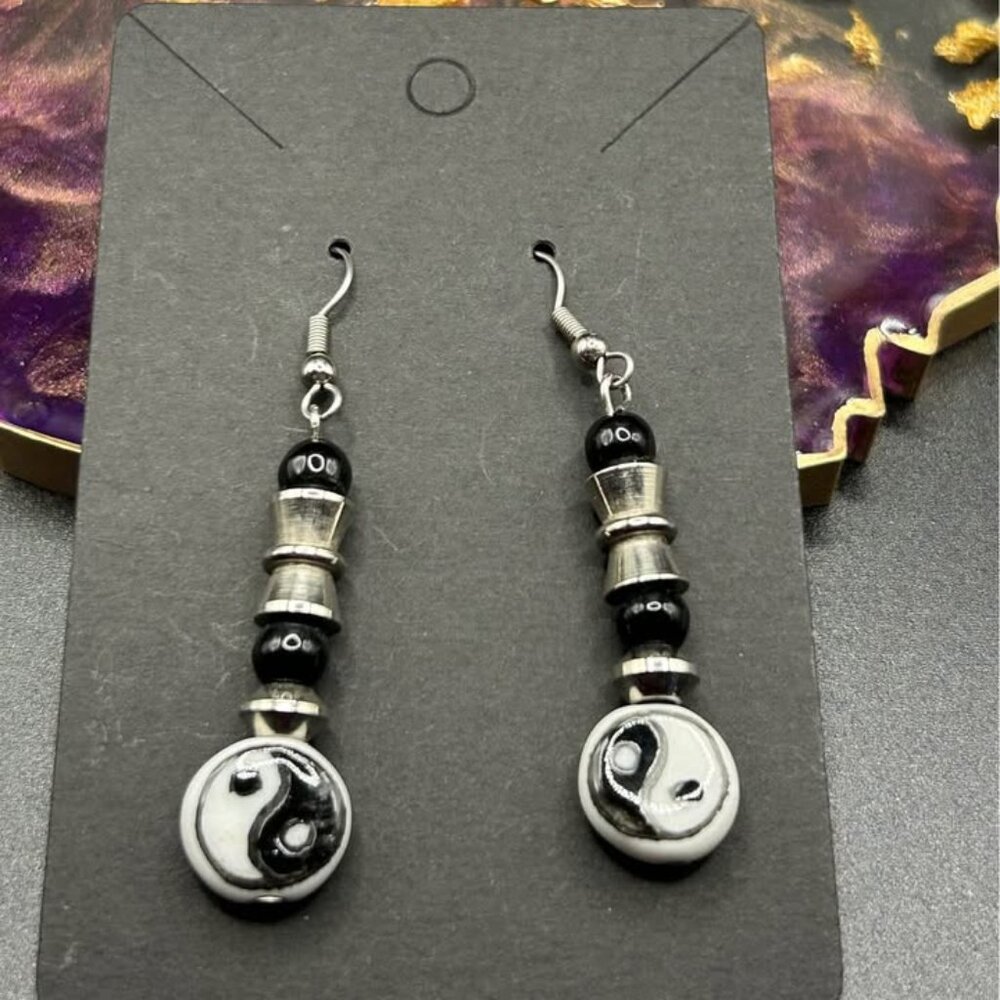 4/ $20 Ying and yang black bead costume earrings